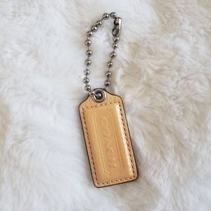 Coach 2.25" patent leather mustard yellow tag charm Keychain fob